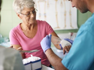 nurse providing wound care