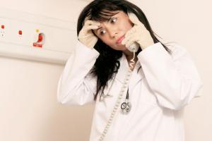 a nurse looking stressed 