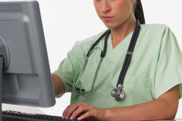 nurse on computer